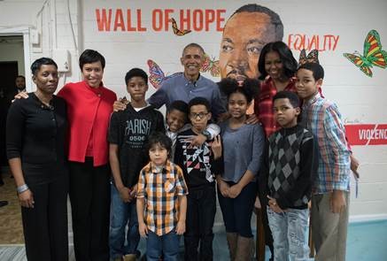 Group photo with Mayor Bowser, President Obama, the First Lady, and children