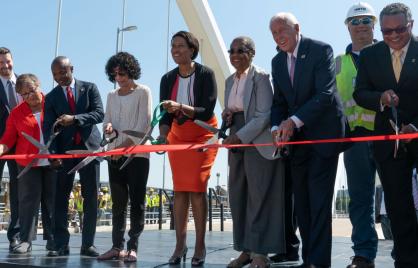 Mayor Bowser, Congresswoman Holmes Norton and others at a ribbon cutting